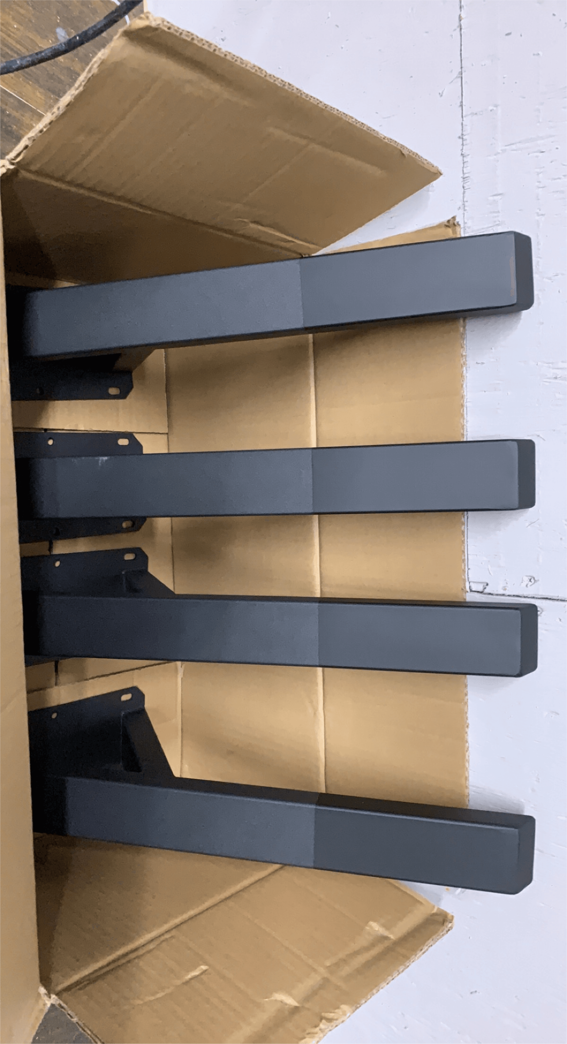 The four steel legs, straight out of the box